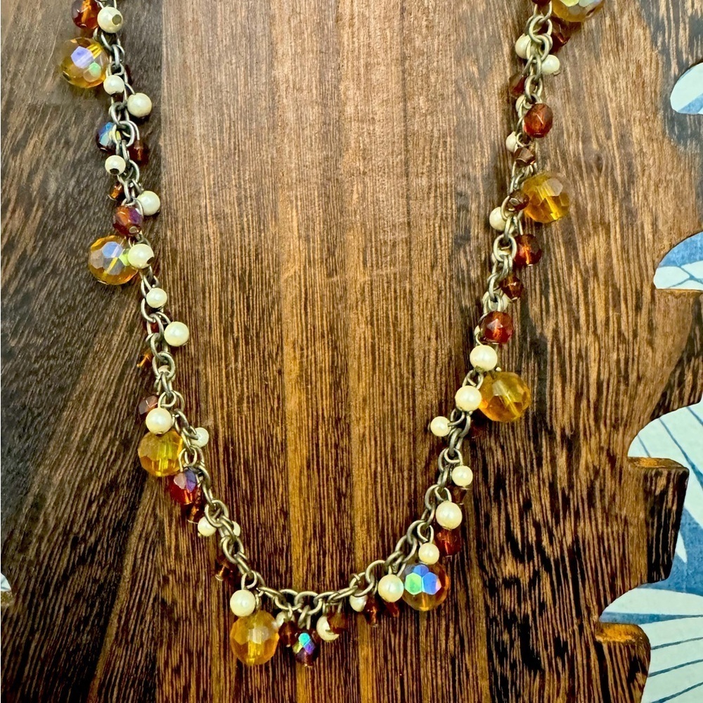 Pearl, red amber, iridescent beaded necklace.